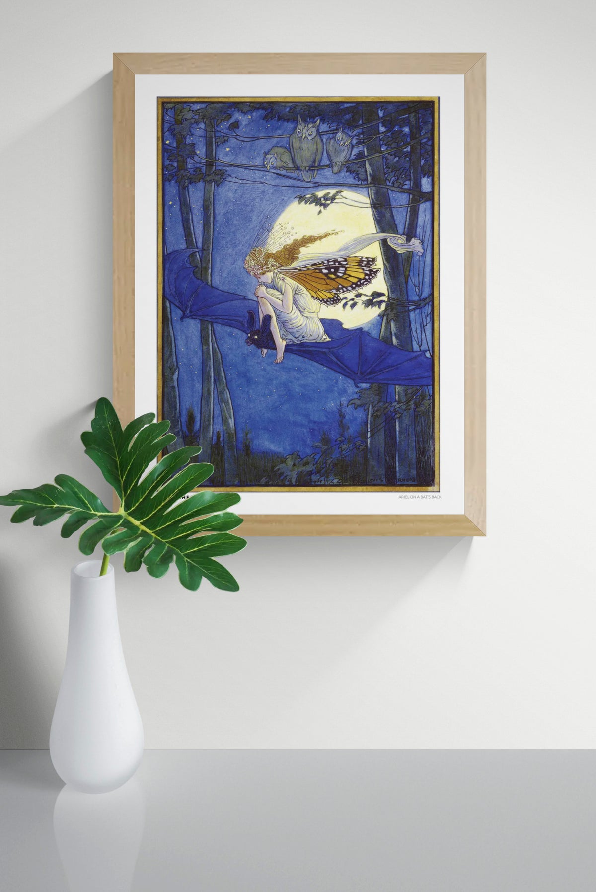 Vertical fantasy illustration by Louis Rhead showing a winged fairy riding a bat beneath a glowing full moon, with three owls in a deep blue forest. Vintage storybook art in blue, gold and yellow, reproduced as a decorative digital print.