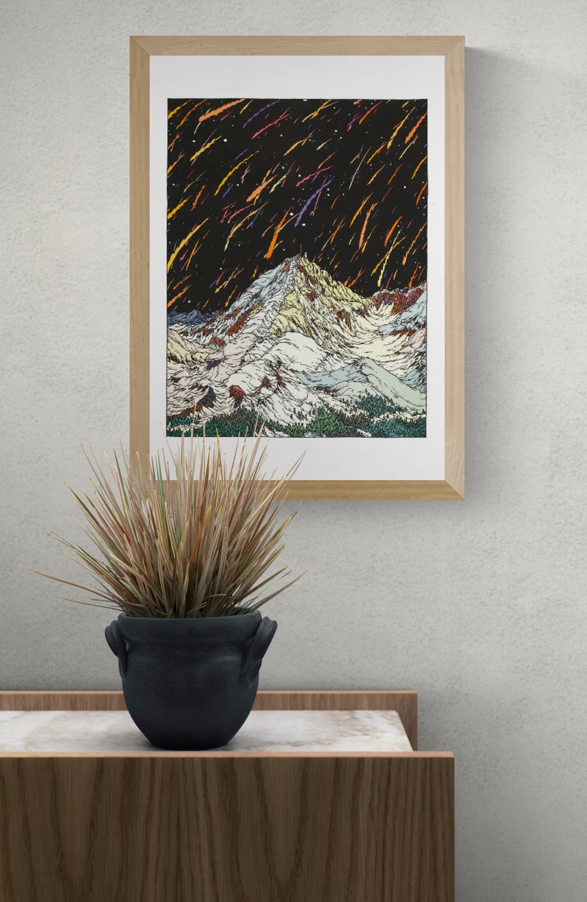 Pic Du Midi by Clément Vuillier, vertical risograph art print showing snowy mountain peaks beneath a black sky with orange, pink, purple and yellow streaks, ideal as bold contemporary wall art.