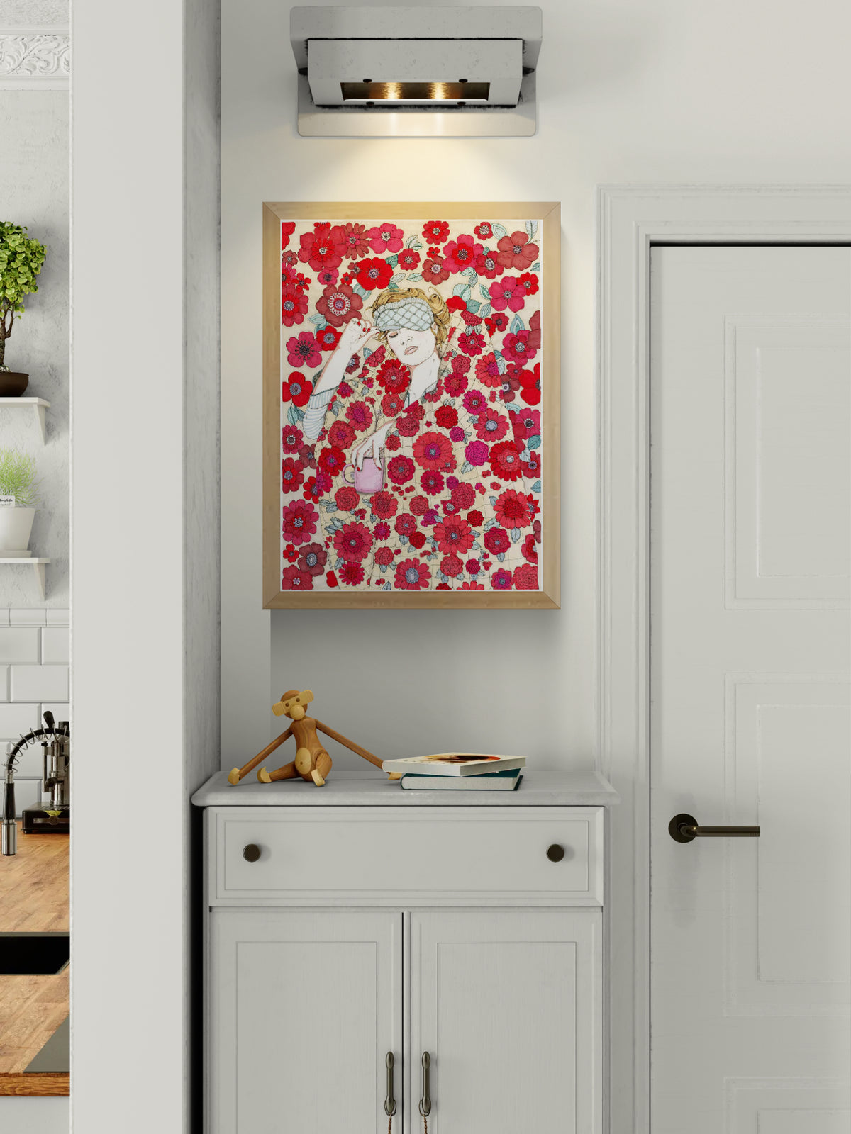 Art print by Ana Jarén showing a woman wrapped in a vibrant floral duvet with a pink coffee mug in hand, surrounded by delicate red and pink flowers — cosy, feminine, and ideal for interior decoration.