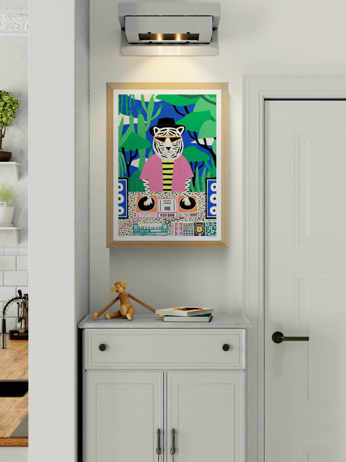 Colorful vertical giclée art print of a white tiger DJ wearing orange sunglasses, a black hat, and a pink shirt, mixing music in a green jungle with a bright blue background. Playful wall art for modern interiors.
