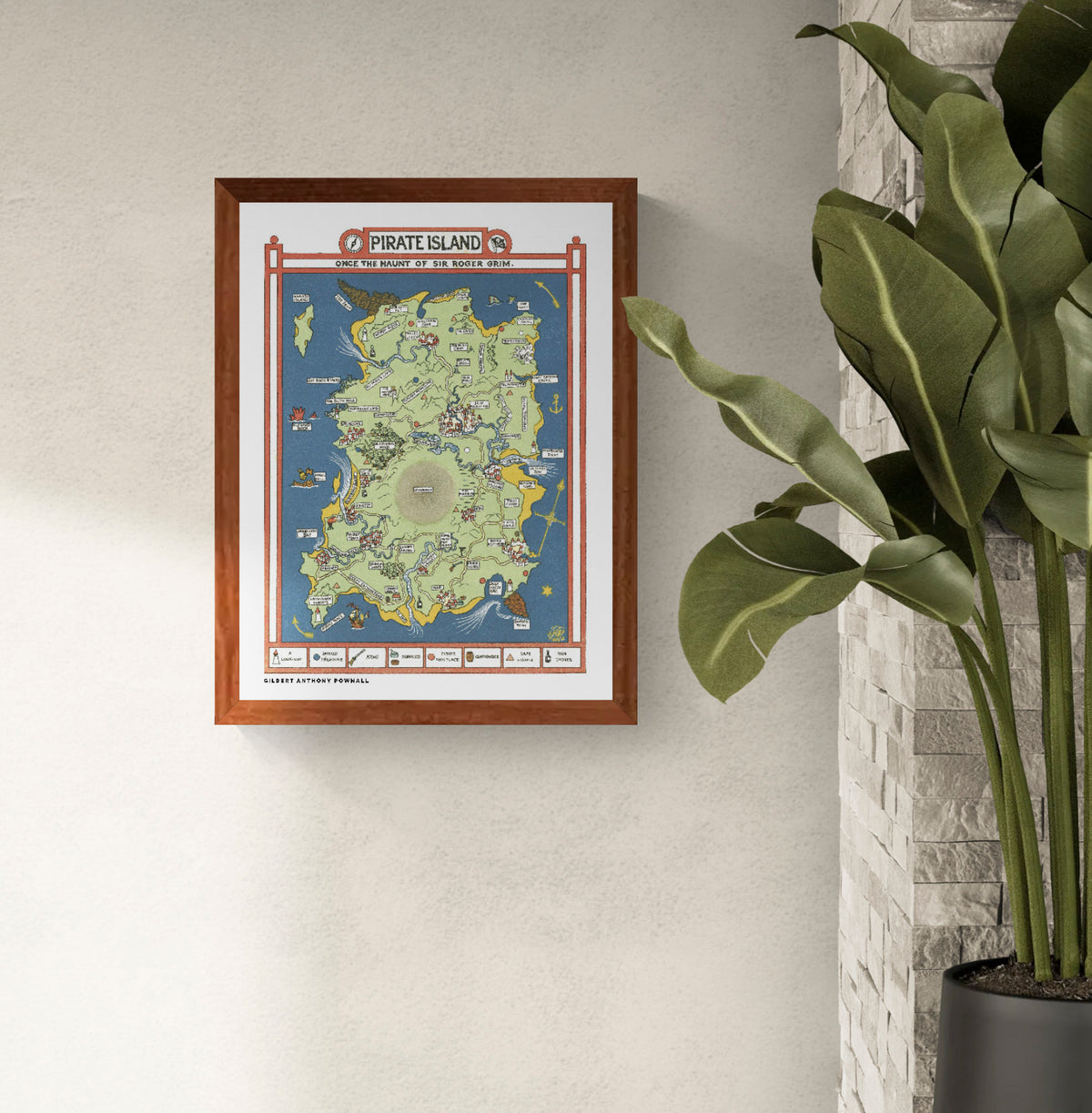 Vintage illustrated Pirate Island map by Gilbert Anthony Pownall, featuring a green island surrounded by blue sea, red borders, hidden treasures, pirate ships and playful landmarks. Vertical digital art print for nostalgic wall decor.