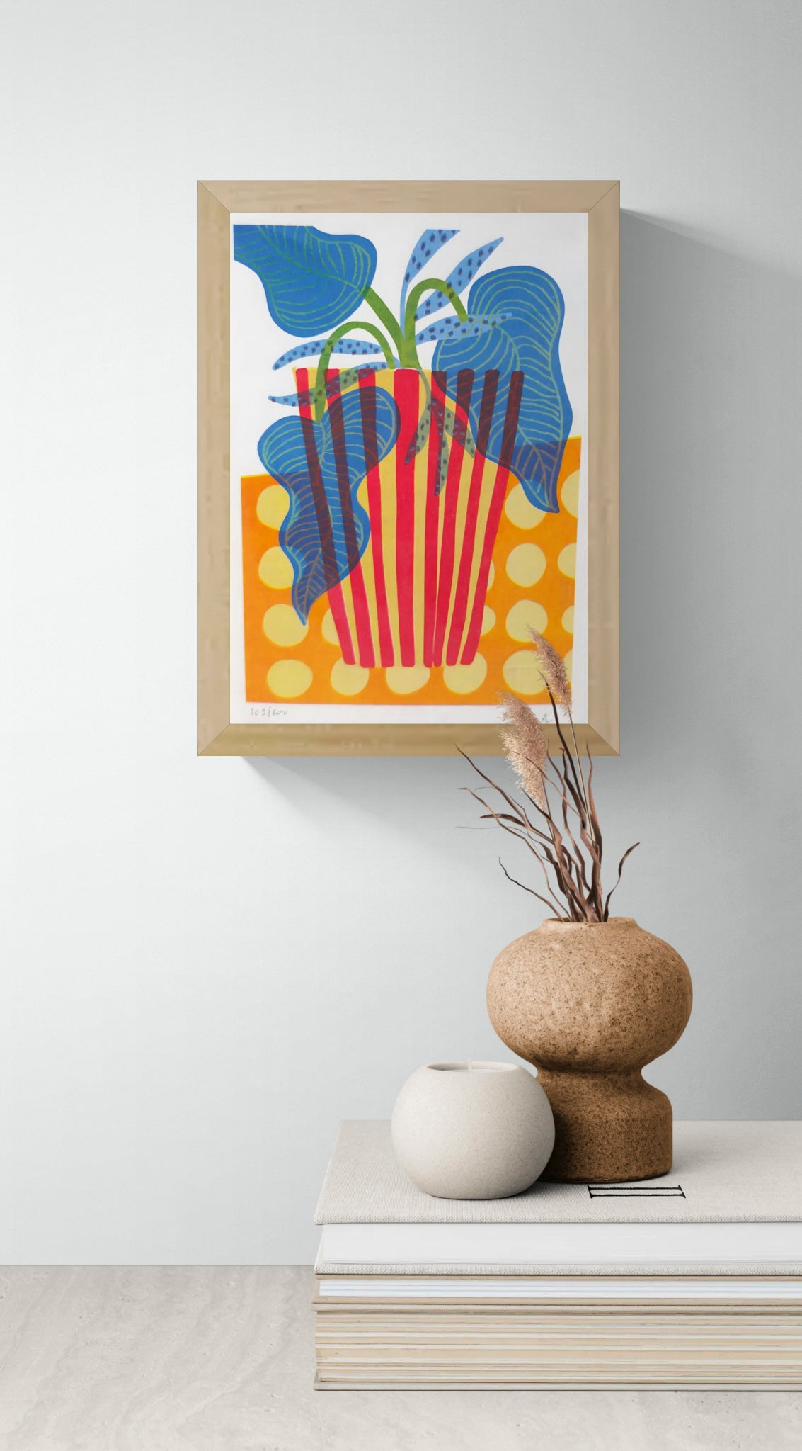 Colourful vertical giclée print by Teresa Rego featuring white flowers in a striped aubergine-shaped pot, with bold pink, red and green patterns for modern wall decor.
