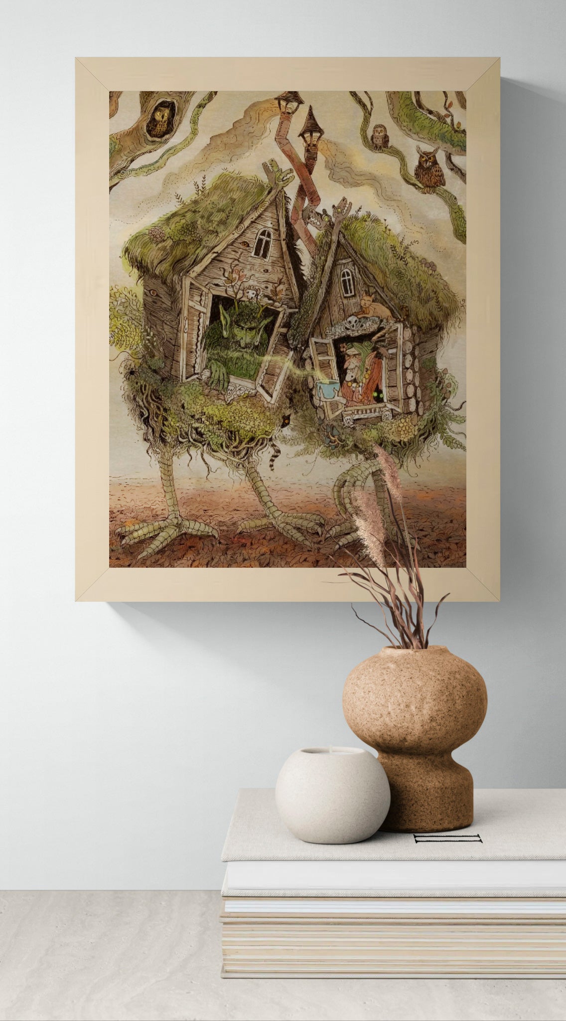 Whimsical folklore-inspired giclée art print featuring two walking woodland cottages on bird-like legs, magical creatures, owls, witches, and detailed forest elements in earthy tones. Vertical fantasy wall art for cozy home decor.