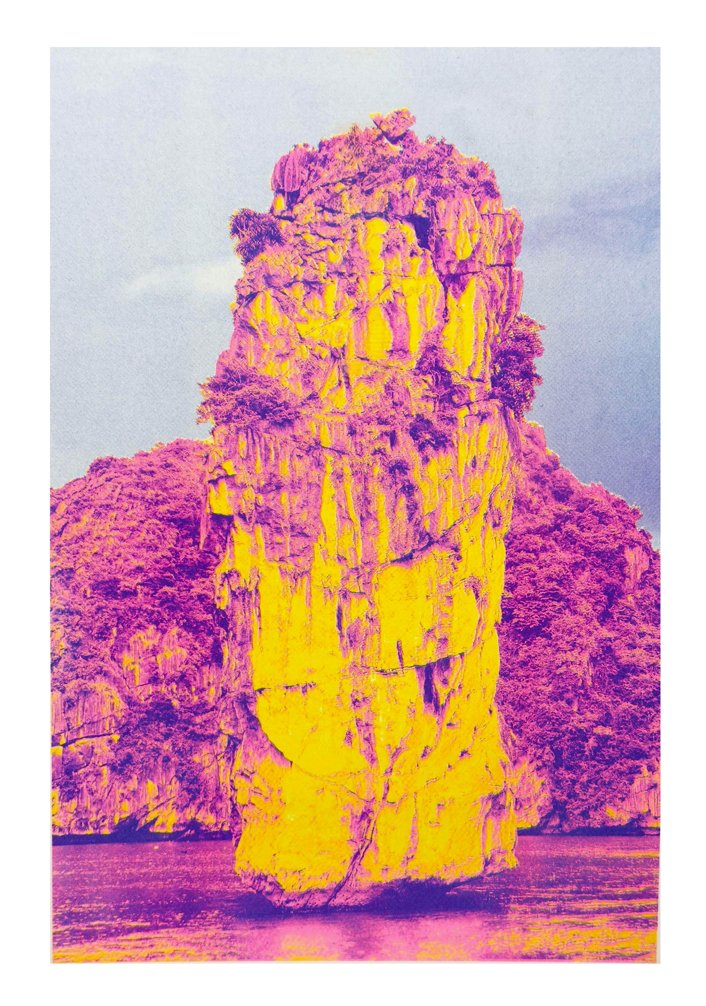 Ha Long Bay risograph art print by PTRVRKD in bold yellow and magenta tones, limited edition A3 poster printed on Munken Pure Rough paper, modern vibrant landscape artwork for home decor, contemporary risograph print made in the Netherlands.