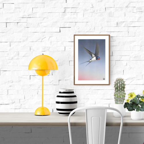 Elegant and minimalist illustration by Vrijformaat titled 'Barn Swallow,' featuring a sleek swallow in mid-flight against a smooth gradient background that transitions from soft pink to deep blue. This refined composition captures the grace and motion of the bird with clean lines and subtle texture—ideal for nature lovers, bird enthusiasts, and fans of serene, contemporary design