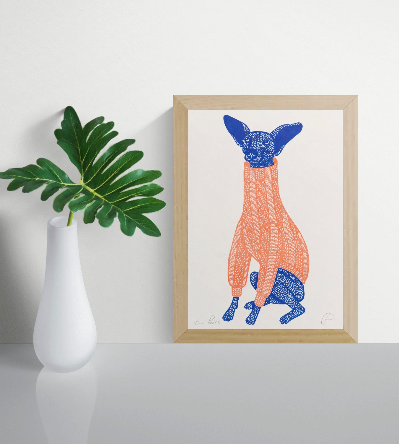 Playful portrait risograph of a small blue dog with oversized ears wearing a coral knitted jumper, printed vertically in bold blue and orange tones, ideal as quirky animal wall art.