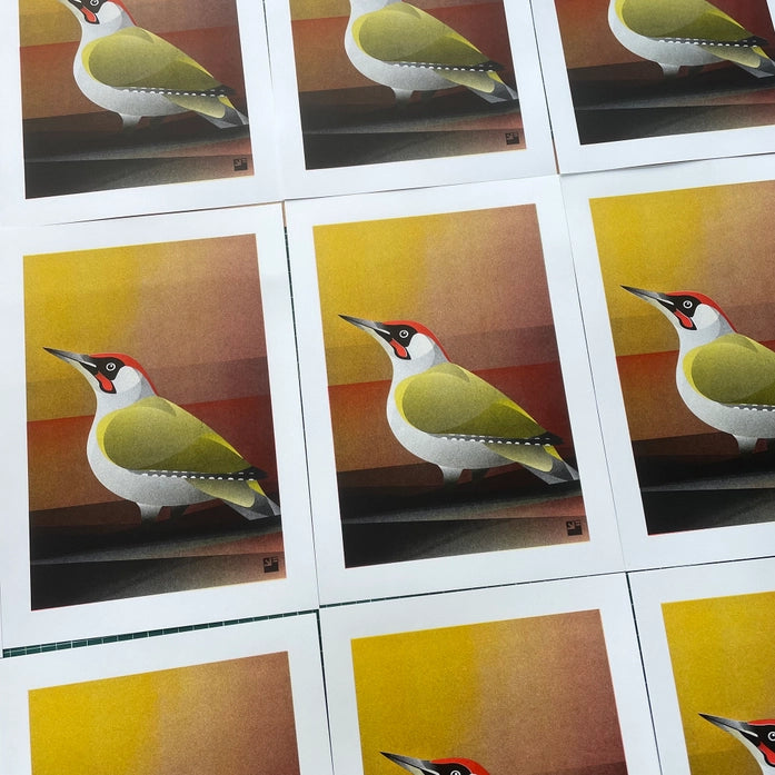 Colorful risograph art print of a European Green Woodpecker (Picus viridis) by VrijFormaat, minimalist bird illustration in yellow, green, and red tones on A4 eco-friendly paper – modern wall art made in the Netherlands