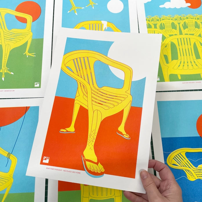Bold risograph print of a yellow plastic chair with human legs in flip-flops against a red and blue background – No Place like Home by VrijFormaat, A4 art print from the Seat for Thought series.