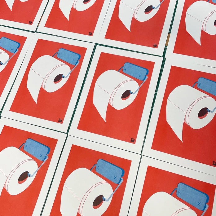 Minimalist risograph art print of a toilet paper roll in bold red and blue by VrijFormaat. Modern pop-art style wall art celebrating everyday design objects. Printed on Biotop 160g paper, A4 size, made in the Netherlands.