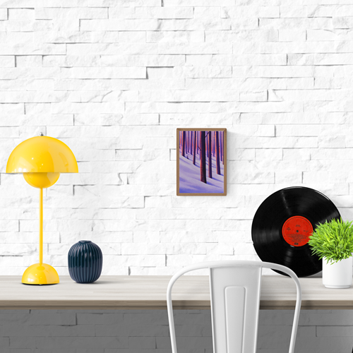 A6 Giclée print "Winter Woods" by Linde Raats, featuring a snowy forest scene with tall vertical trees in purple-orange tones and a small hare peeking from behind, printed on fine art paper.