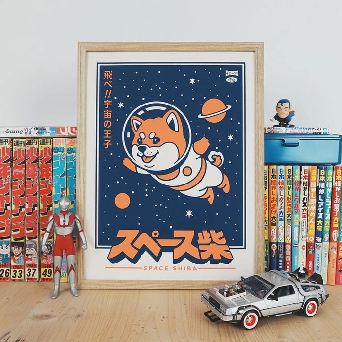 Framed art print of "Space Shiba" by Yeaaah! Studio, featuring a cute orange Shiba Inu dog in a retro spacesuit floating in a starry navy blue outer space with planets, illustrated in a Japanese pop-art style. Printed on 300g Old Mill premium paper, perfect for fans of kawaii, sci-fi, and Japanese culture art prints.