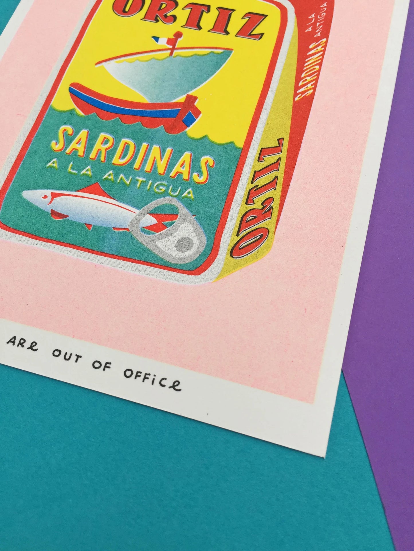 Colorful risoprint illustration of a vintage Ortiz sardine can by We Are Out Of Office, printed with soy ink on 300g Biotop paper – bold kitchen wall art in retro pop art style.
