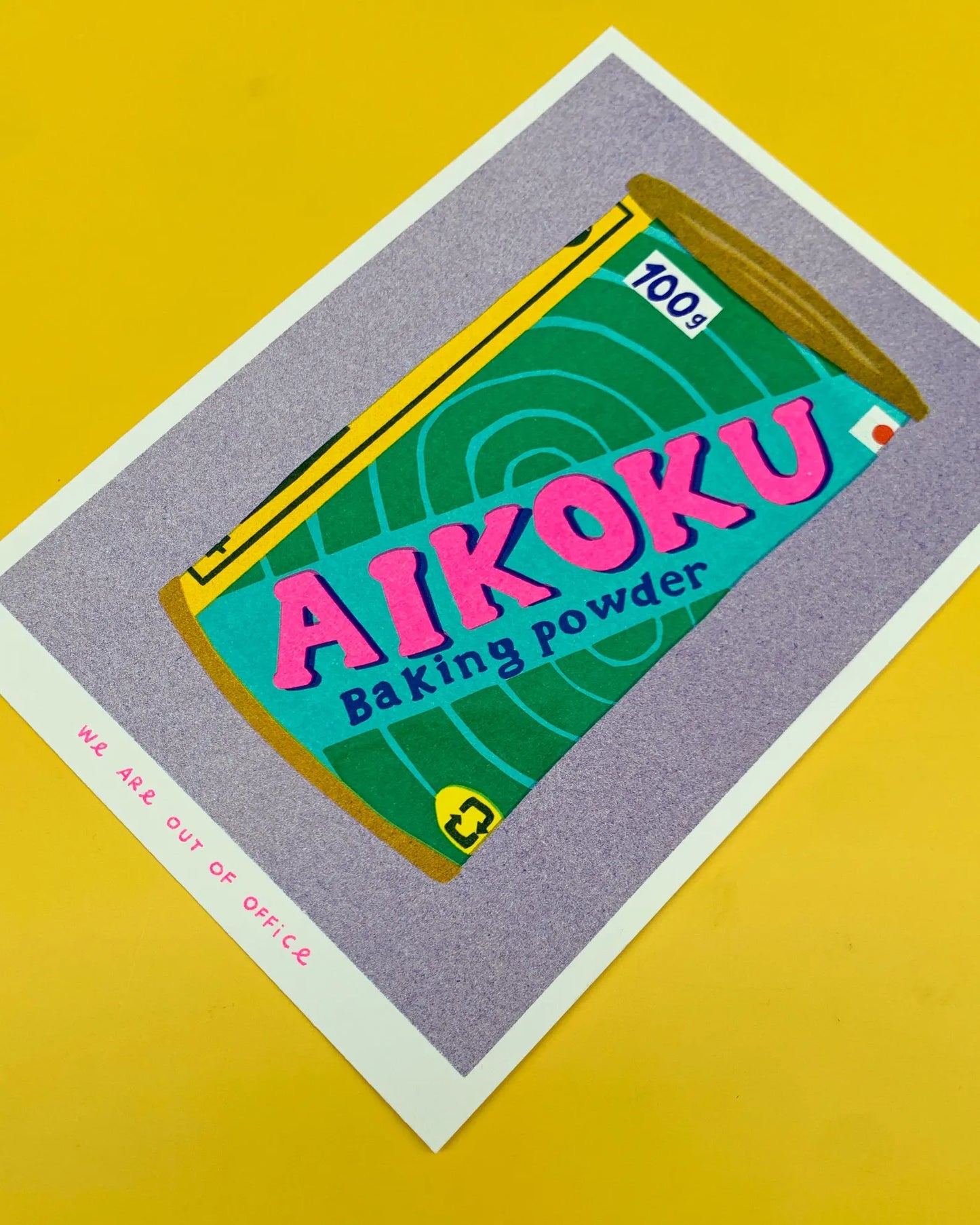 Colorful risograph print of a vintage Japanese Aikoku baking powder can by We Are Out of Office – pop-art kitchen illustration with pink, teal, and yellow details on Biotop paper.