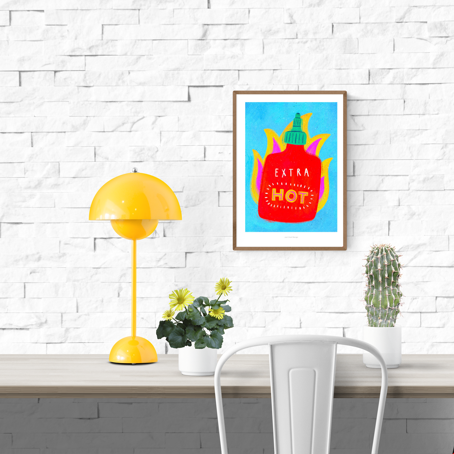 Giclée art print featuring a bright red hot sauce bottle labeled "EXTRA HOT" with stylized yellow and pink flames on a vivid blue background, created by Just Cool Design.