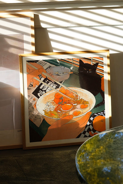 Midnight Noodles by Enikő Eged, 50 x 50 cm archival giclée art print featuring a cozy noodle bowl scene with a black cat, warm orange tones, and Japanese-inspired details.
