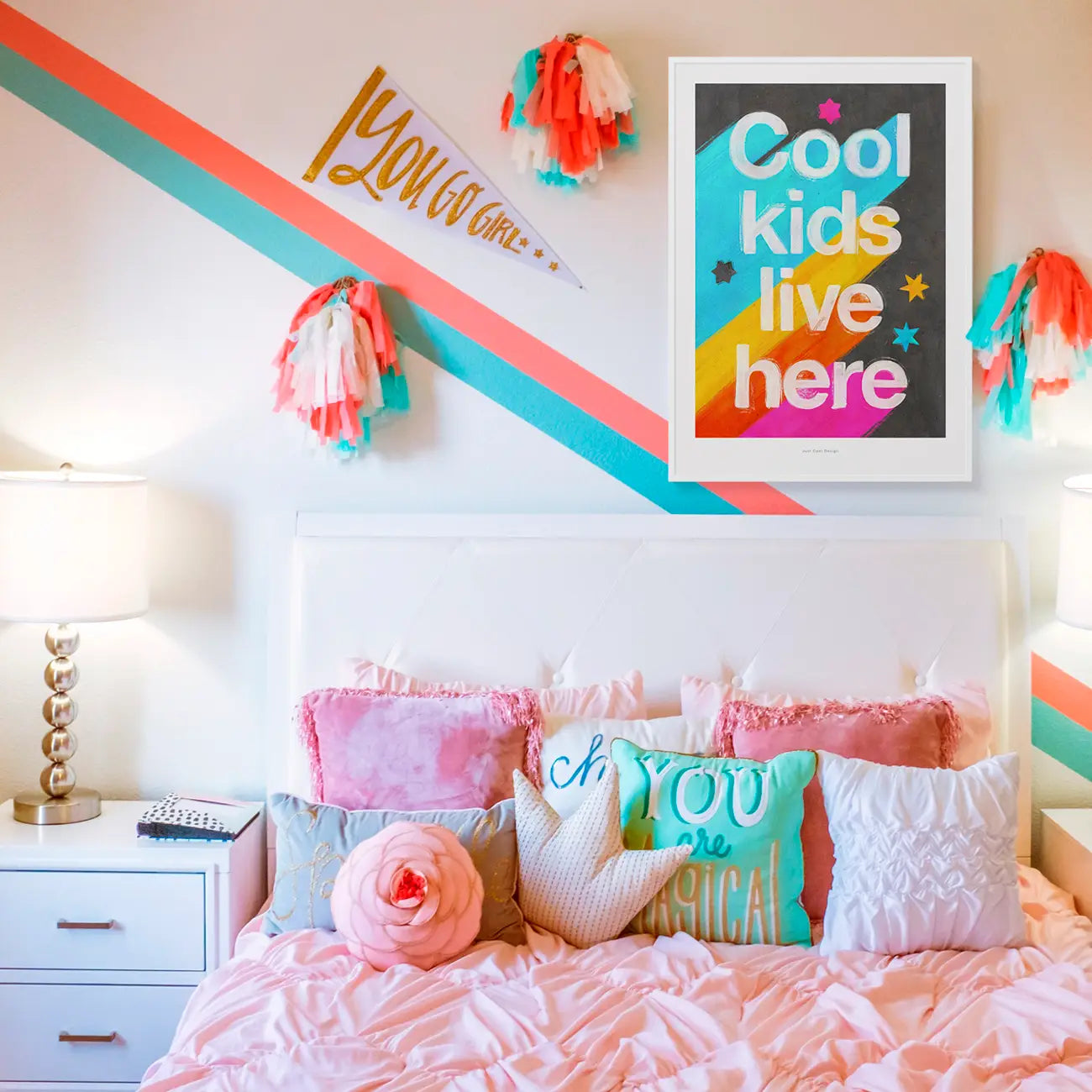 Giclée art print by Just Cool Design with the phrase "Cool kids live here" in bold white letters over a bright rainbow background with stars, ideal for colorful children's rooms or playful modern decor.