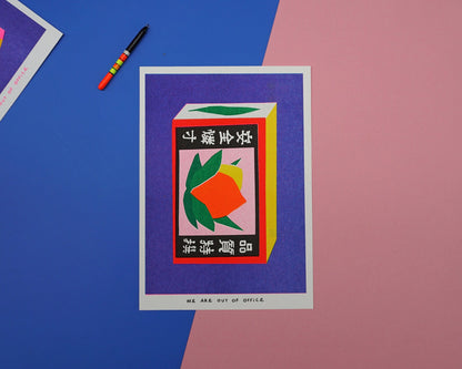 Colorful risoprint of a vintage Japanese matchbox with bold fruit illustration and kanji symbols, modern wall art by We Are Out Of The Office, 13 x 18 cm print made in the Netherlands.
