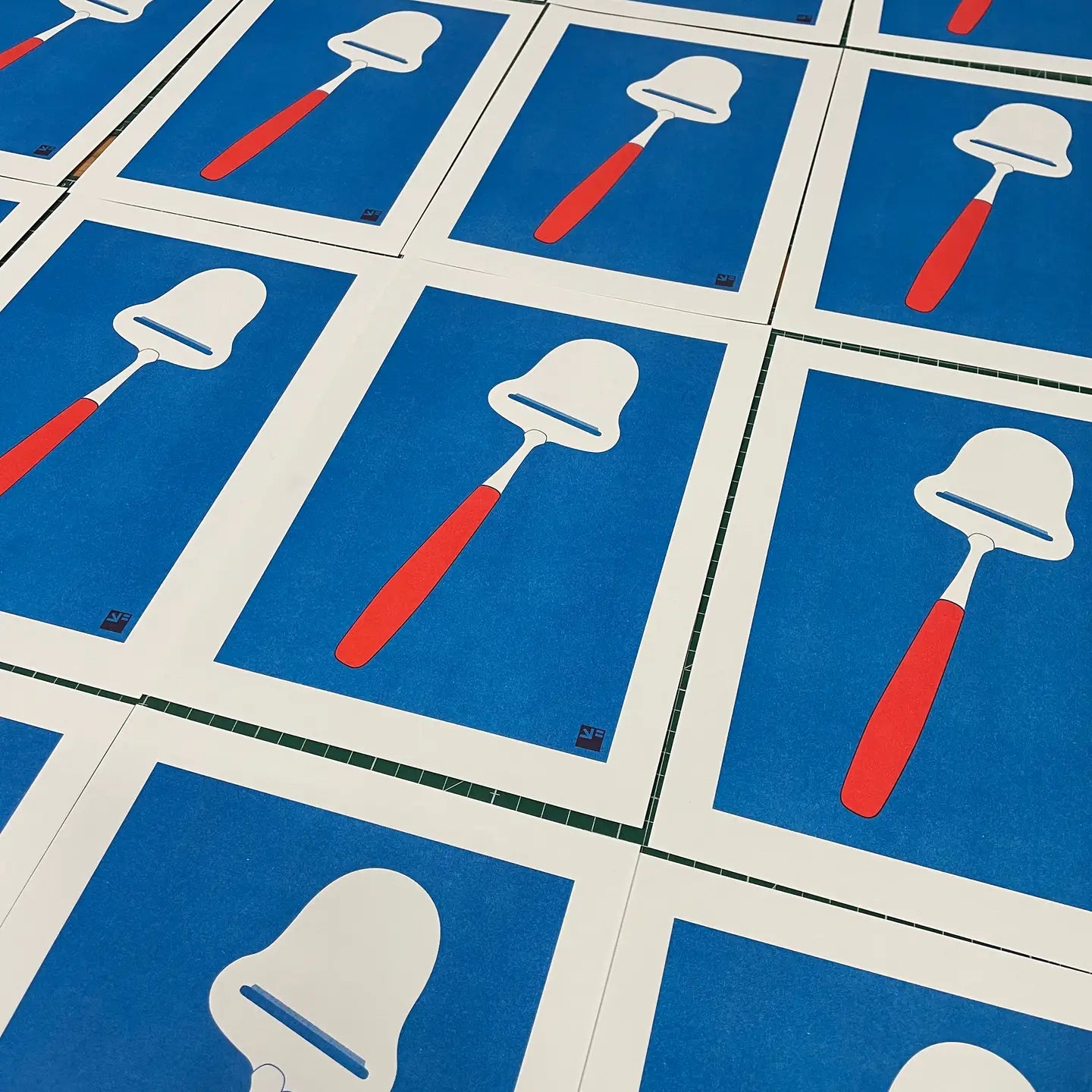 Minimalist risograph art print titled Cheese Slicer by VrijFormaat, featuring a red-handled cheese slicer on a deep blue background. Bold two-tone design inspired by everyday Dutch kitchen objects, printed on Biotop 160g paper in Utrecht. Perfect wall art for modern interiors and design enthusiasts.