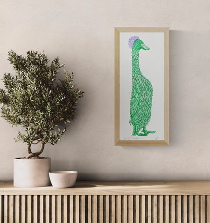 Duck Duck Mousse by Strangford, green duck with purple feathered crest on a tall risograph print.