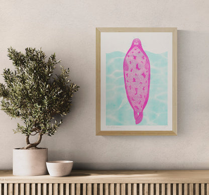 Pink seal floating against turquoise water in a playful contemporary risograph style, printed in portrait A3 format. Colourful humorous wall art for kitchens, offices and modern interiors.