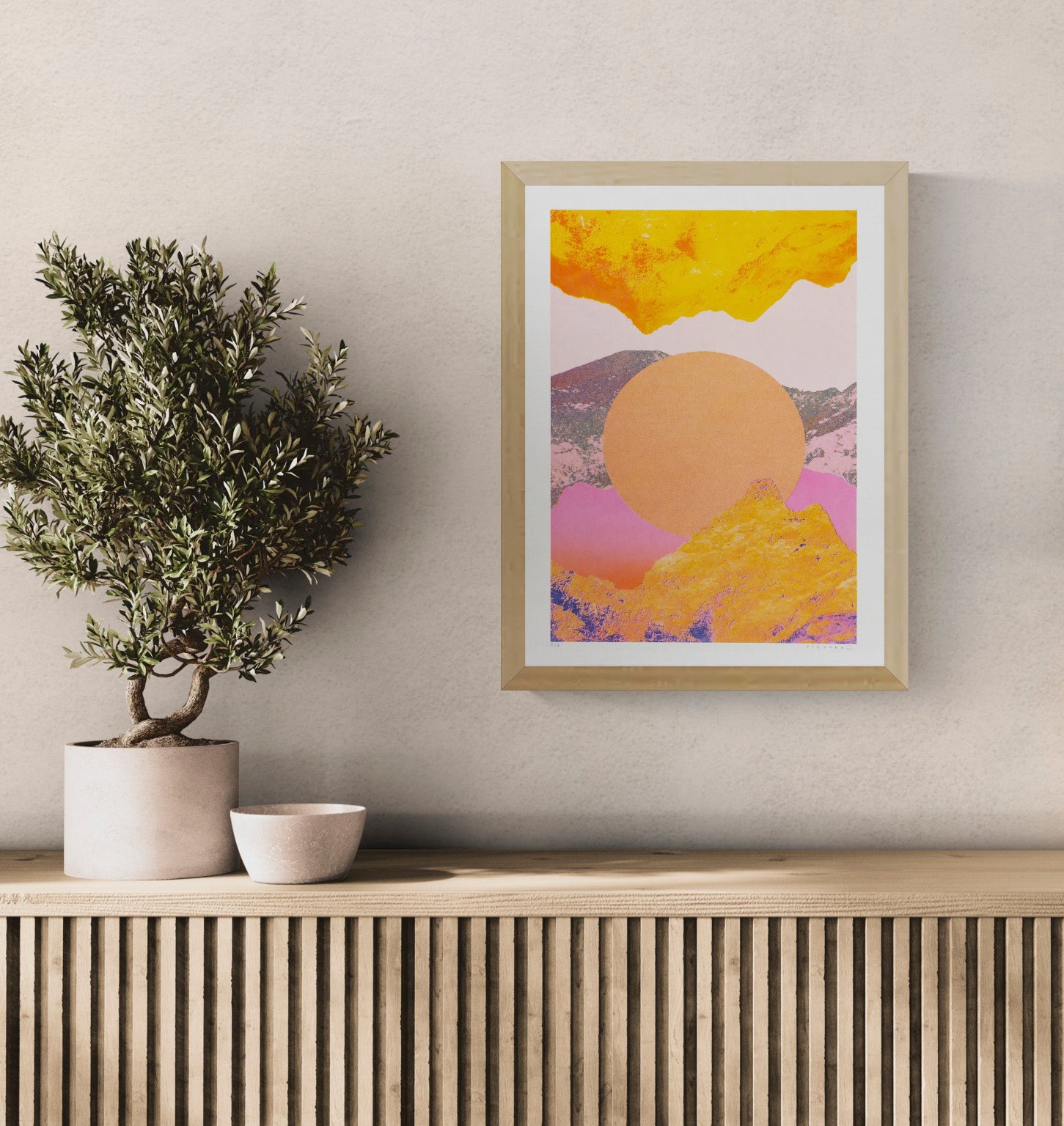 Vibrant A3 risograph art print by PTRVRKD featuring abstract mountain fragments in orange, pink, and yellow tones with a large sun-like circle; eco-friendly limited edition print made in The Netherlands, perfect for modern interiors.