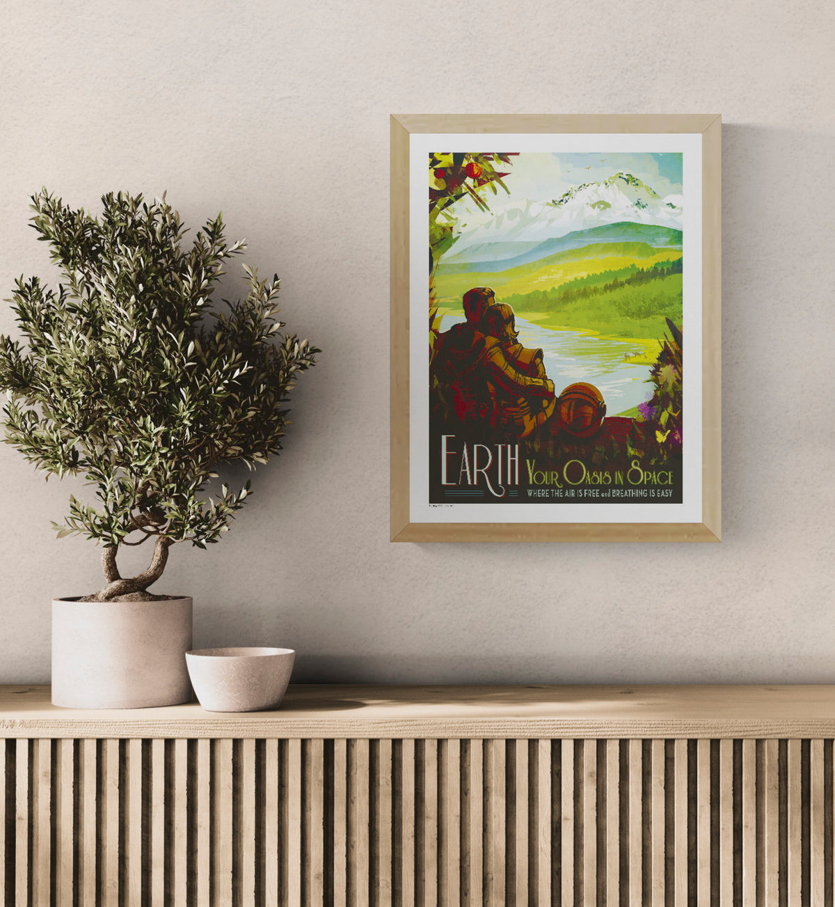 NASA Earth retro travel poster showing a couple overlooking a vivid mountain lake landscape, with green, blue, yellow and orange tones. Vertical digital print for colourful wall art and home decor.