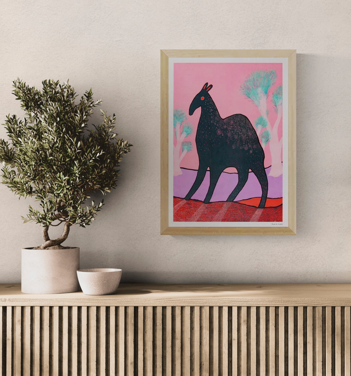 Whimsical illustration titled Beest 3 by Louise de Meester, depicting a mysterious dark creature with red eyes and subtle fur texture, set against a surreal pink and lavender landscape with dreamlike turquoise trees