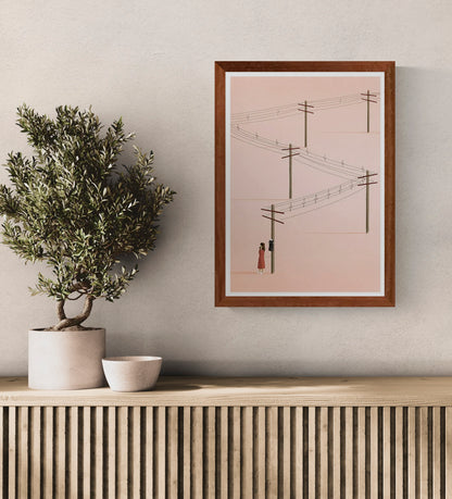 Minimalist art print titled 'Call' by Ana Yael, featuring a woman in a red dress using a vintage telephone on a wooden pole, with telephone wires stretching across a soft pink background – poetic and nostalgic wall art available at Galerie Frits