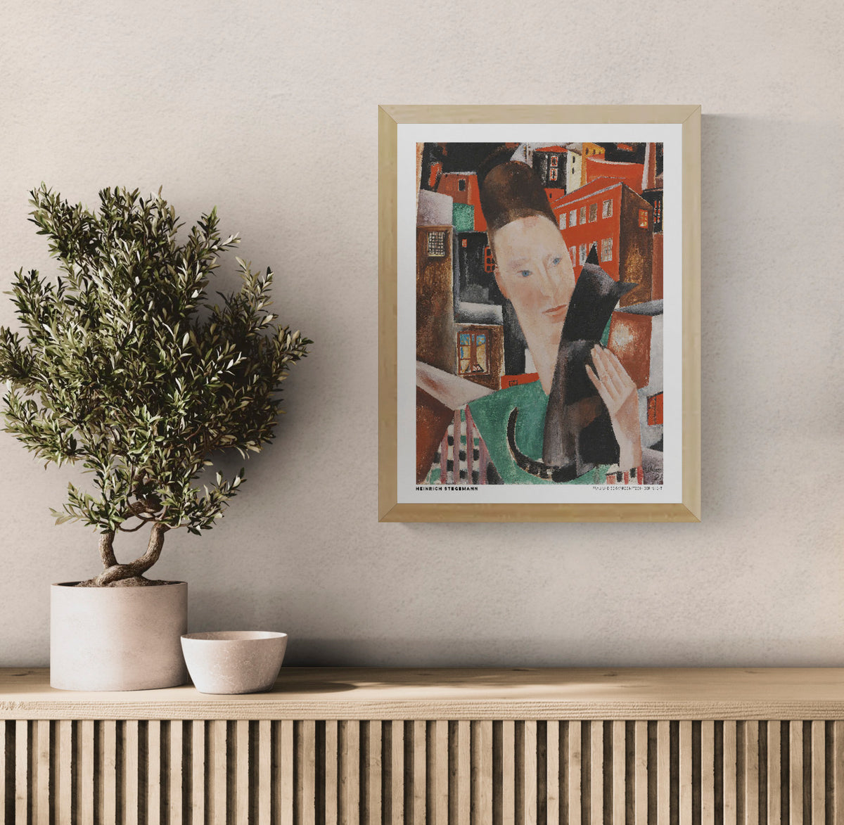 Portrait-oriented digital art print of Woman and Black Cat at Night by Heinrich Stegemann, showing a woman holding a black cat against an expressionist cityscape in red, brown, and green. Distinctive wall art for a living room.