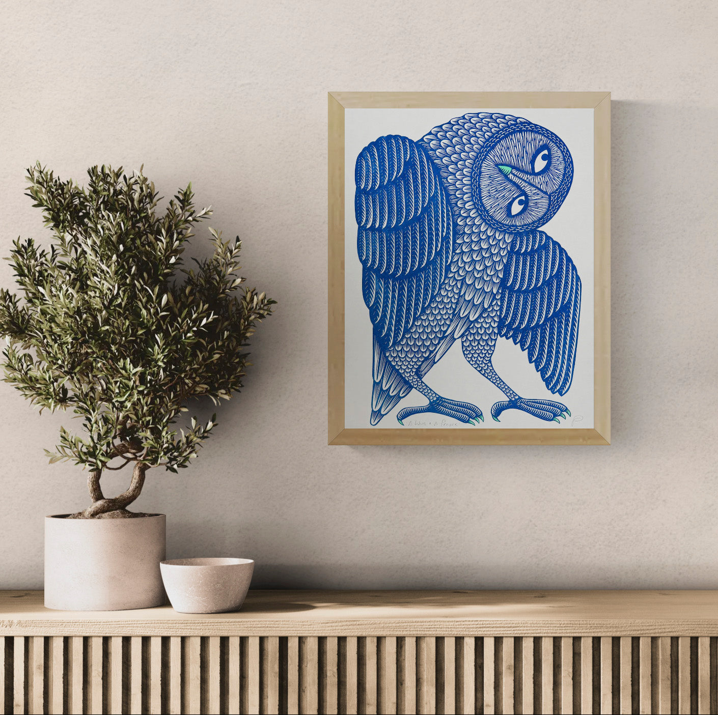 A Wing and a Prayer by Strangford, vertical A3 risograph art print of a stylised owl in dark blue and mint green with detailed graphic feathers, ideal for playful modern wall decor.