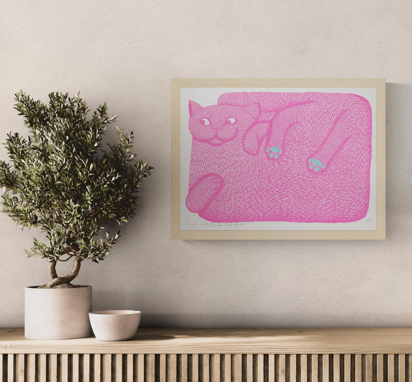 Fluorescent pink reclining cat with mint green paw pads, illustrated in Strangford’s quirky graphic style. Horizontal A3 risograph print for playful cat wall art and contemporary home decor.