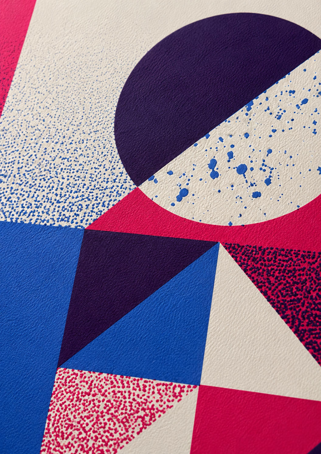 Geometric abstract handmade screenprint by PLUMO featuring bold blue, pink, and purple shapes with circles, triangles, and textured graphic elements on a clean white background, modern contemporary wall art in A3 size.
