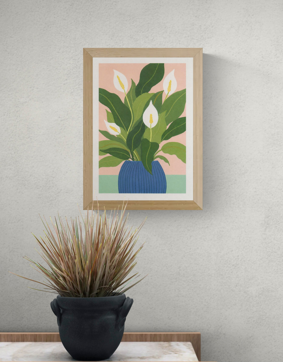 Peace Lilly botanical art print by Leen De Pelseneer featuring white peace lily flowers and large green leaves in a blue vase on a soft pink background, contemporary A4 digital wall art print.