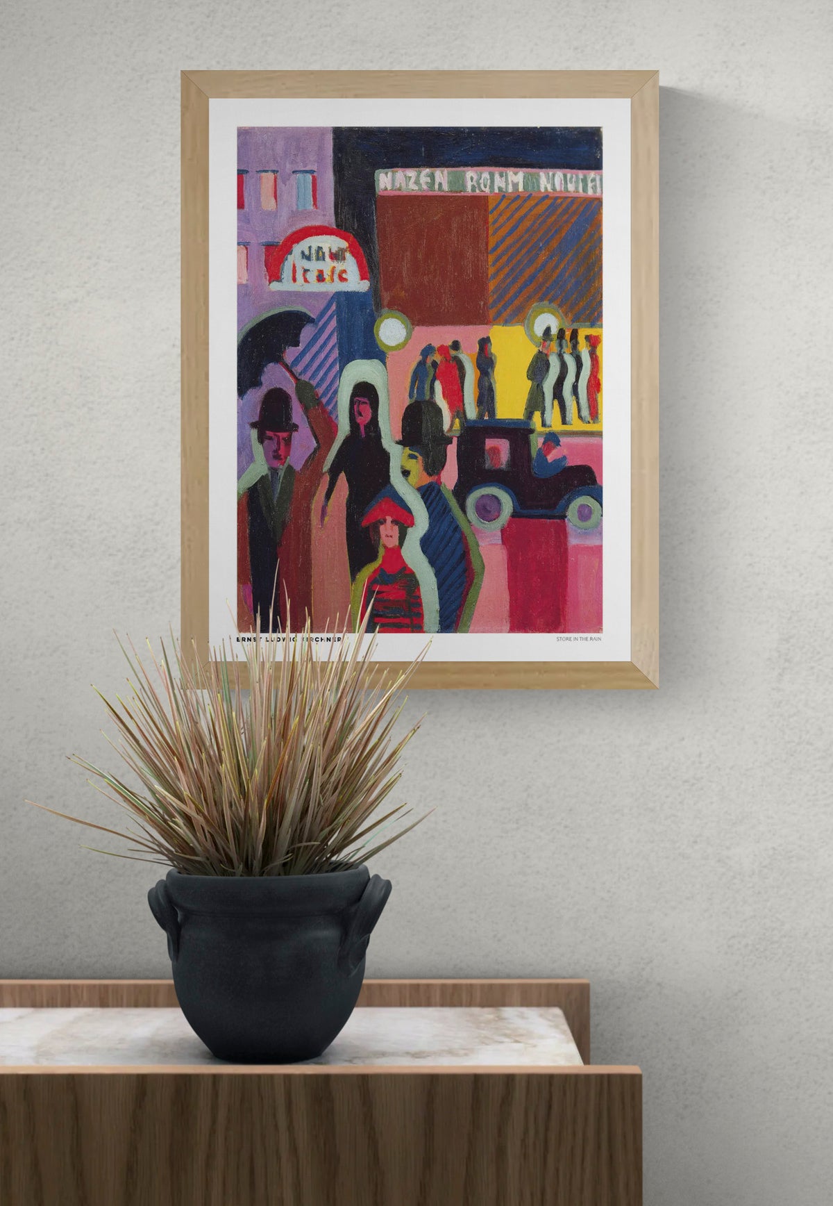 Store in the Rain by Ernst Ludwig Kirchner, a vertical expressionist city street scene with pedestrians, umbrellas, vintage cars, and colorful storefronts in vivid pink, red, blue, and yellow. Digital art print for eclectic wall decor.