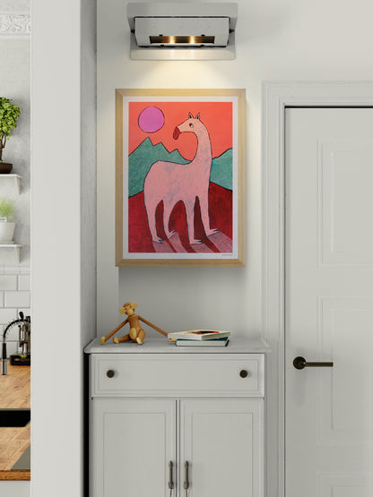 Playful and surreal illustration titled 'Beest 1' by Louise de Meester, featuring a quirky pink creature with an elongated neck set against bold red mountains, green hills, and a purple sun – a whimsical and bold art print for contemporary interiors