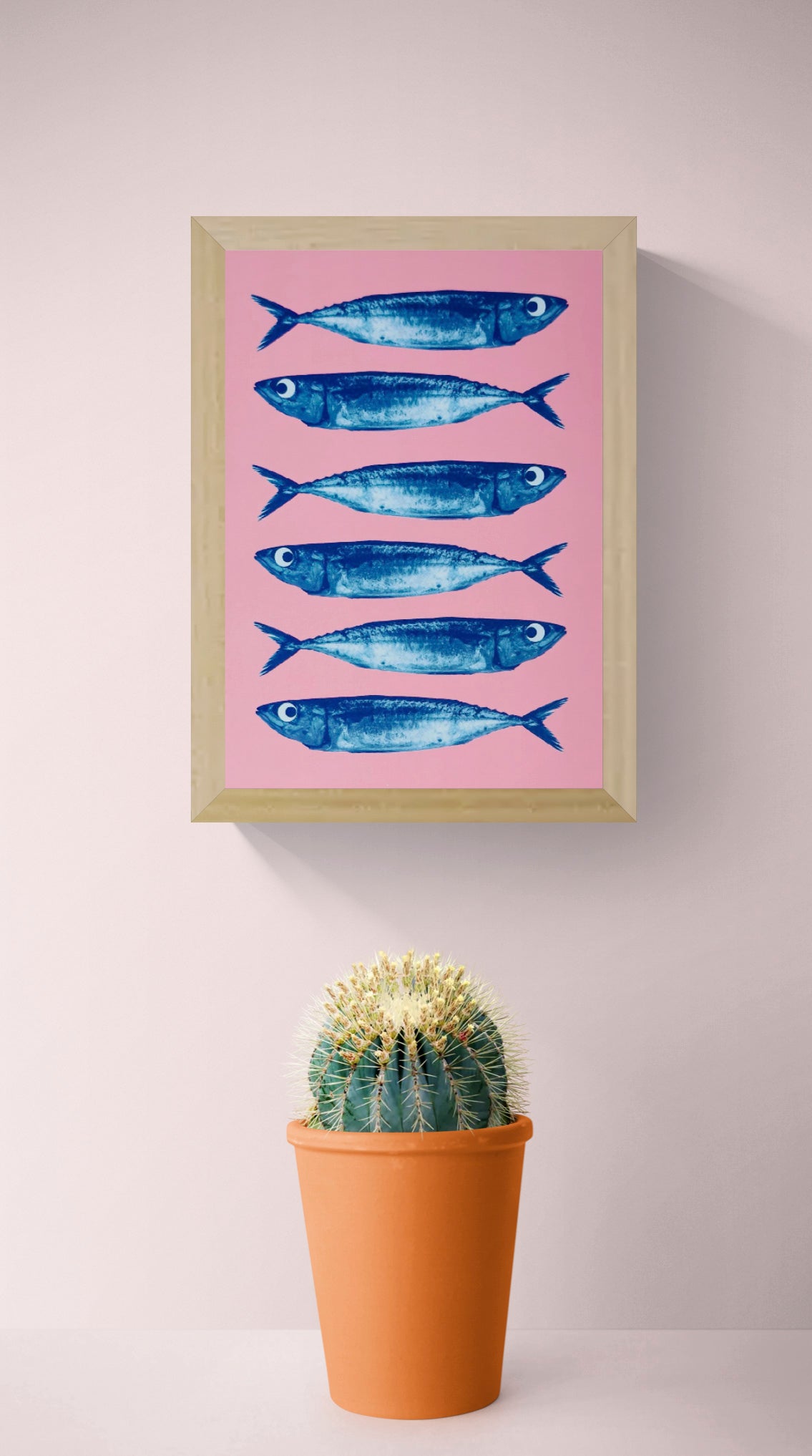 Sardines art print by PTRVRKD, blue fish on pink background, pop art seafood illustration A5, modern graphic wall art.