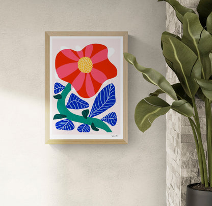Vertical A3 giclée print of a large red and pink camellia with cobalt blue leaves and a green stem, created in Teresa Rego’s bold botanical style for colourful wall decor.
