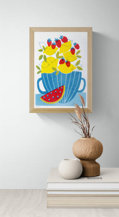 Teresa Rego Lemonade A5 risograph art print with bold yellow lemons, red strawberries and watermelon in blue cup, colorful contemporary kitchen wall art