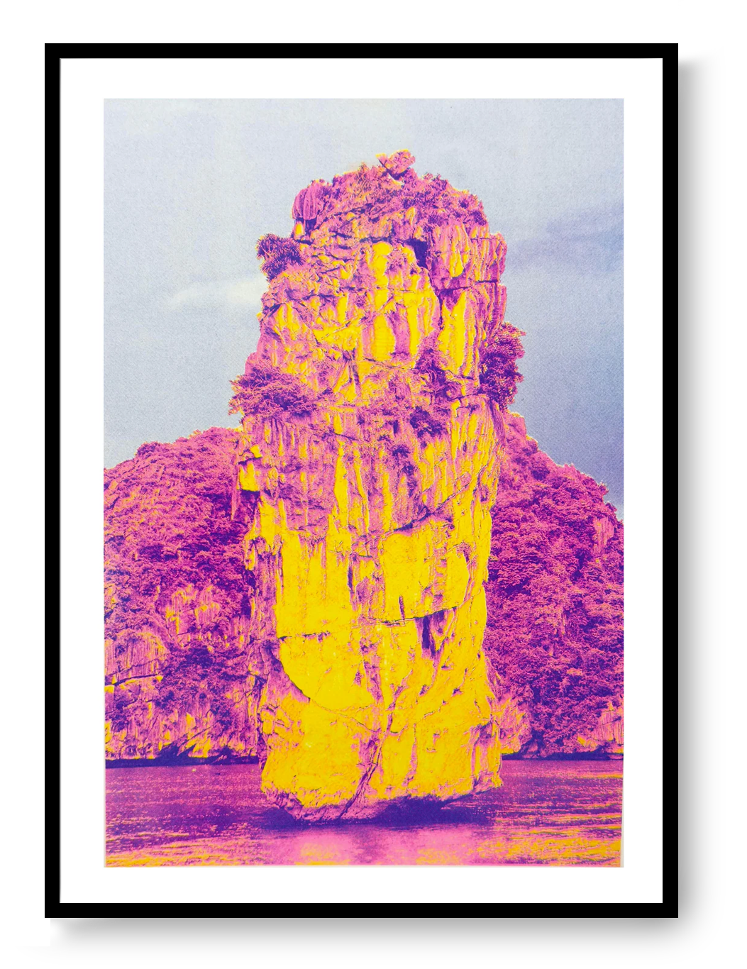 Ha Long Bay risograph art print by PTRVRKD in bold yellow and magenta tones, limited edition A3 poster printed on Munken Pure Rough paper, modern vibrant landscape artwork for home decor, contemporary risograph print made in the Netherlands.