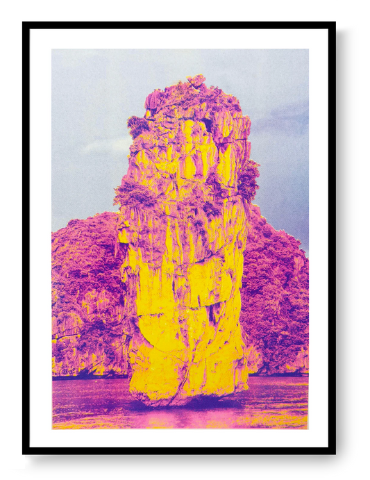 Ha Long Bay risograph art print by PTRVRKD in bold yellow and magenta tones, limited edition A3 poster printed on Munken Pure Rough paper, modern vibrant landscape artwork for home decor, contemporary risograph print made in the Netherlands.