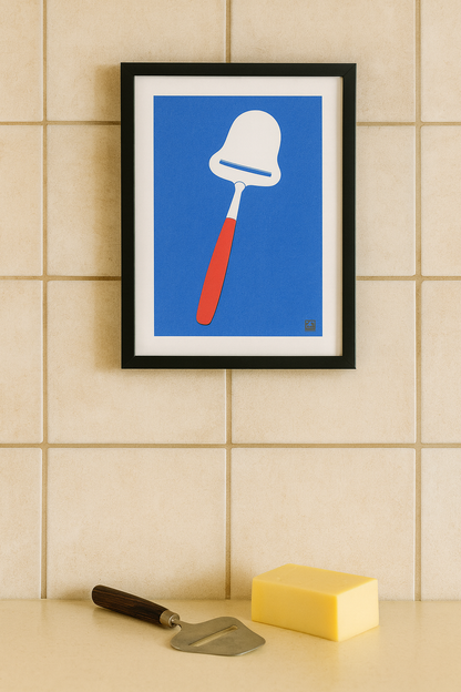 Minimalist risograph art print titled Cheese Slicer by VrijFormaat, featuring a red-handled cheese slicer on a deep blue background. Bold two-tone design inspired by everyday Dutch kitchen objects, printed on Biotop 160g paper in Utrecht. Perfect wall art for modern interiors and design enthusiasts.