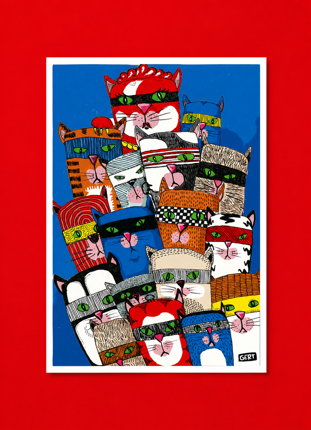 Colorful Cat Gang digital art print by Belgian illustrator Gert Paenen featuring a group of playful masked cats with bright green eyes against a deep blue background, contemporary graphic wall art for modern interiors.