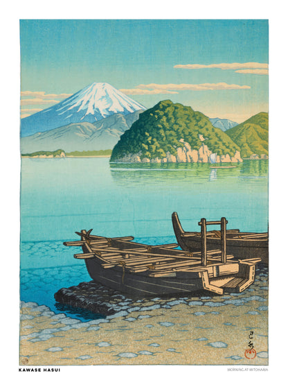 Morning in Mitohama by Kawase Hasui, a vertical Japanese landscape art print showing wooden boats on a turquoise lake, green hills and snow-capped Mount Fuji in soft blue and yellow tones. Digital print for peaceful wall decor.