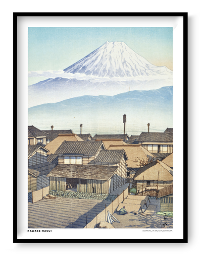 Morning in Motoyoshiwara by Kawase Hasui, Japanese woodblock-style landscape featuring snow-covered Mount Fuji above traditional village rooftops in soft blue and beige tones. Vertical digital art print for serene wall decor.