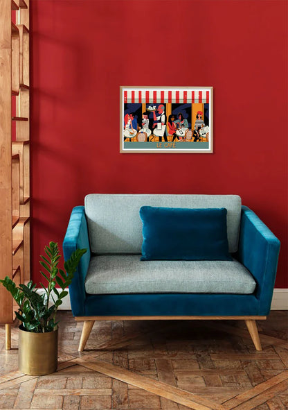 Vintage-style Paris café illustration art print titled "Le Café" by Paul Thurlby, featuring colorful characters, a striped awning, and outdoor tables in a 50x70 cm fine art format.