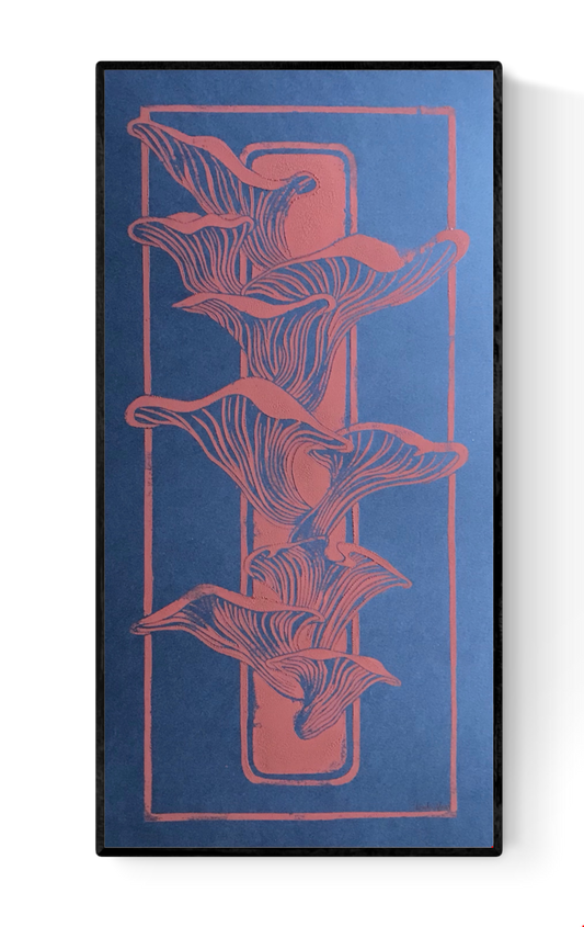 Handmade linocut print of coral-colored mushrooms growing from a piece of wood on a deep blue background; organic nature-inspired artwork, 25.5 x 50 cm by Belgian artist Leda Vaes.