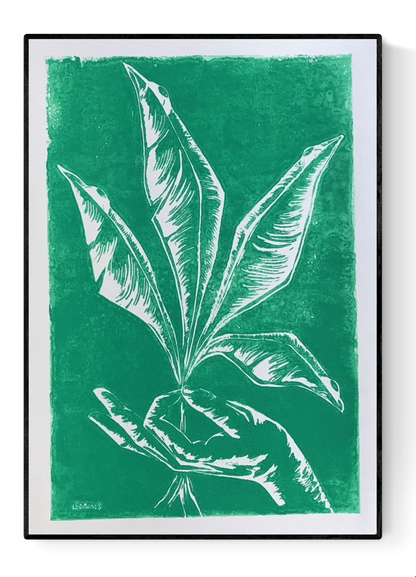 Handmade green linocut by Belgian artist Leda Vaes showing a hand gently holding tall, elongated plant leaves, carved in crisp white lines with a natural, minimalist, botanical aesthetic; nature-inspired art print for modern home décor.