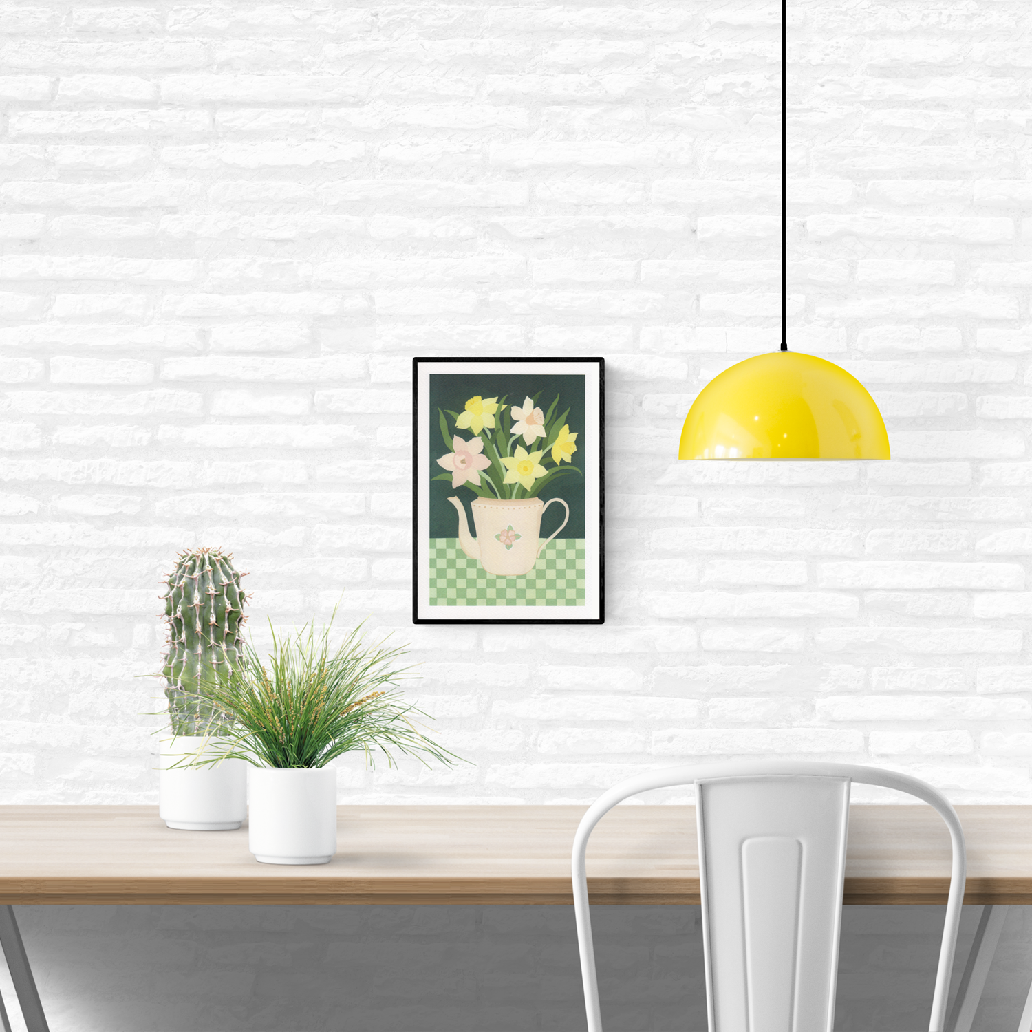 “Daffodils” by Belgian illustrator Leens – a botanical A4 digital print featuring a pastel floral teapot filled with yellow and pink daffodils, placed on a green checkered tablecloth with a dark green background.