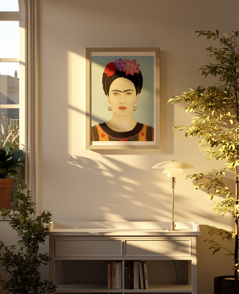 Colourful portrait art print of Frida Kahlo by Soizic Bihel featuring flowers in her hair, skull earrings, and a light blue background, contemporary pop culture wall art print for modern interiors.