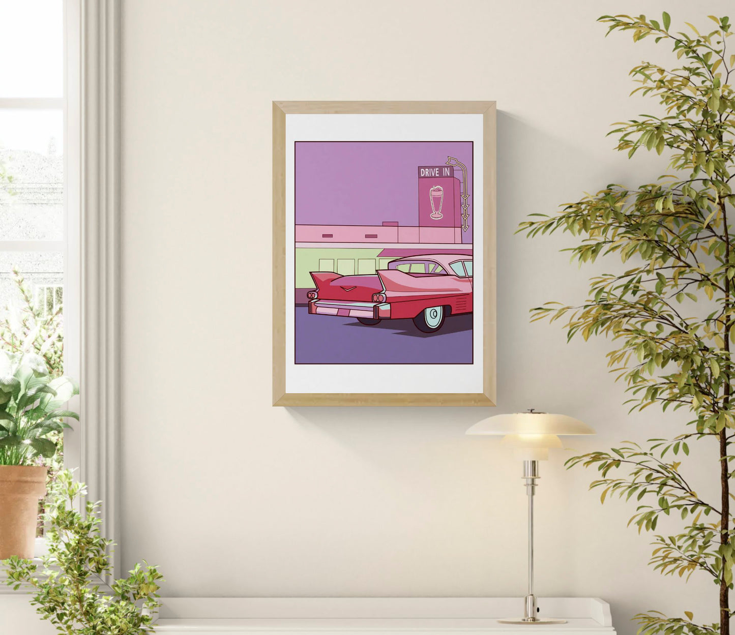 Retro Americana A3 art print by Floor 4 Productions featuring a pink vintage car in front of a neon drive-in diner with purple and pink tones.